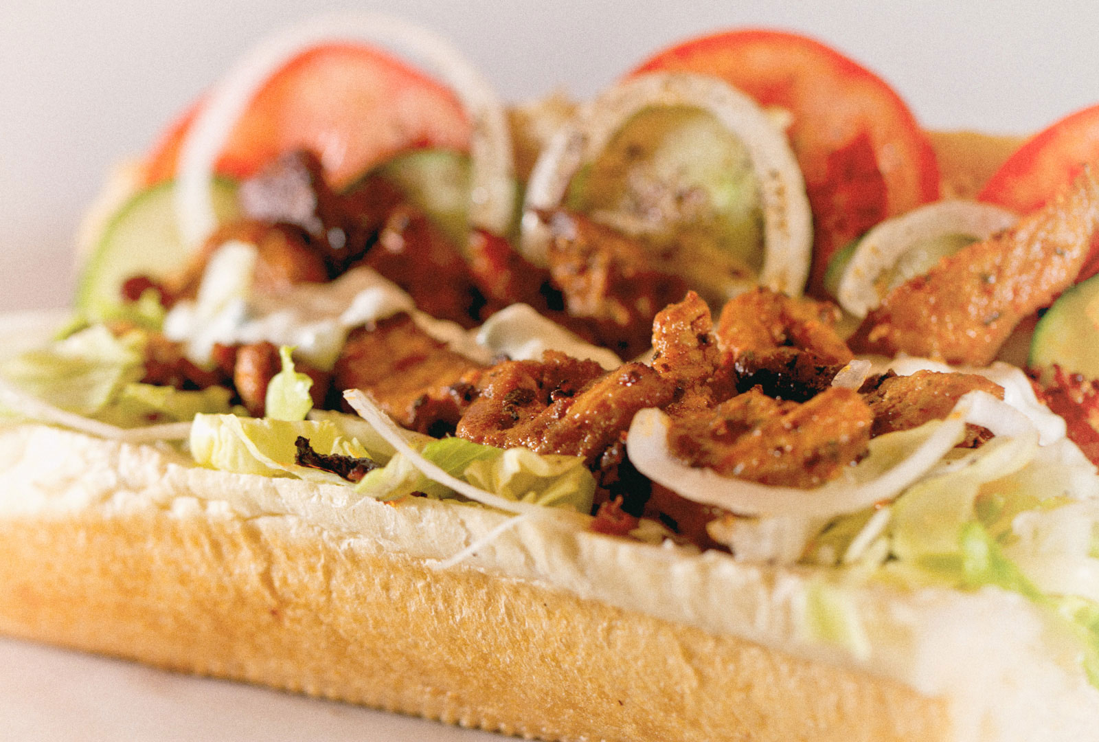 Produkt Detailfoto Sub-Sandwich mit Gyros, Schafskäse und Zaziki